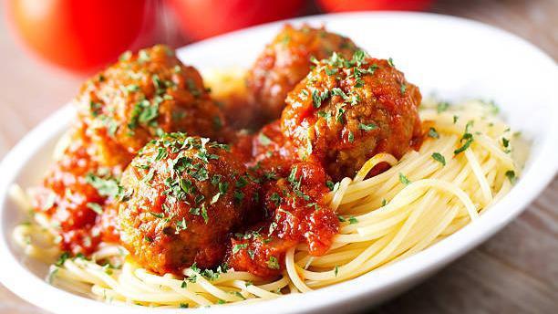 Spaghetti & Meatballs · Meatballs, spaghetti, marinara sauce, and Parmesan cheese served over pasta.