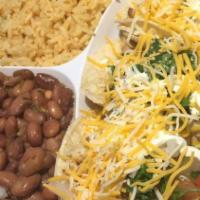 Taco Combo · 3 soft tacos of your choice .
Served with mexican yellow rice and beans