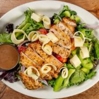 Grilled Chicken Salad · Mixed greens, tomatoes, red onions, green peppers, Provolone, grilled chicken breast and bal...