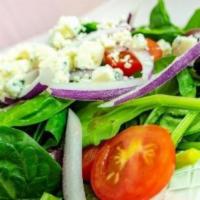 Spinach Salad · Fresh baby spinach, tomatoes, red onions, Kalamata olives, gorgonzola and balsamic vinaigret...
