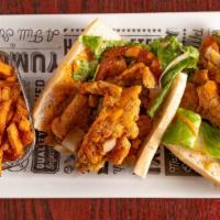 Krave Fish Hoagie · Fried Whiting topped w/ lettuce, tomato, sautéed onions and Krave sauce. Served on a 12 inch...