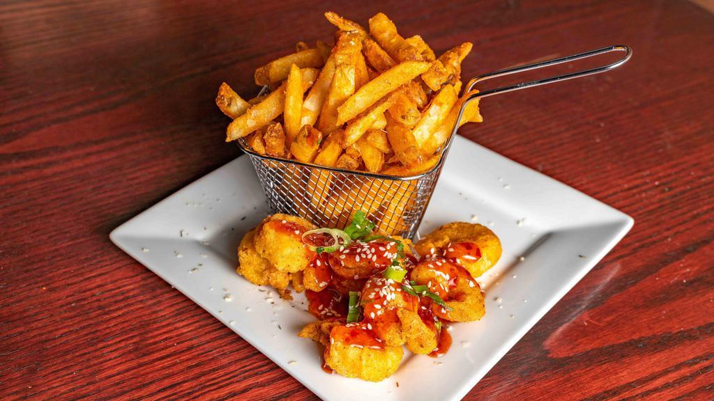Thai Chili Shrimp · 8 wild caught shrimp drizzled with sweet and spicy sauce, topped with scallions and sesame seeds, served w/ seasoned fries