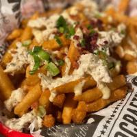 Crab Fries  · Our House Seasoned fries topped with, house aoli, real crab meat, scallions and bacon. This ...