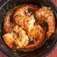 Half Dozen Steam Shrimp  · 6 large shrimp, tossed in garlic butter sauce and minced garlic.