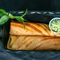 Masala Dosas · Thin crepes stuffed with potatoes and onions.