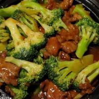 Beef With Broccoli · Comes with steamed white rice.
