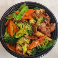 Hunan Beef · Sliced Beef with Mixed Vegetable in a brown SPICY sauce.  Serve with Steamed WHite Rice