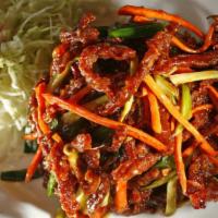 Crispy Shredded Beef · Hot and spicy. Thinly sliced fried beef with carrots and celery. Come with steamed white ric...