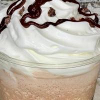 Frozen Hot Cocoa Special · Cocoa Powder, Chocolate Syrup, Cacao Nibs, Oats, Simple Syrup, Whole Milk. Topped with Whipp...