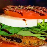 Joe The Boss Eggplant Salad · Golden breaded eggplant with fresh mozzarella, tomatoes, spring mix, olive oil and balsamic ...
