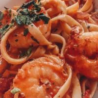 Shrimp Linguini (Red & White) · Shrimp, extra virgin olive oil, fresh garlic, Italian parsley and chili flakes. In Red or Wh...