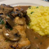 Veal Marsala · Fresh veal seared with mushrooms, marsala wine sauce with risotto.
