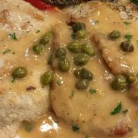 Veal Piccata · Fresh veal seared, lightly topped with caper lemon piccata sauce with veggies.