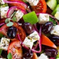 Greek · Romaine lettuce, tomato, cucumbers, red onions, kalamata olives, green peppers and Feta chee...