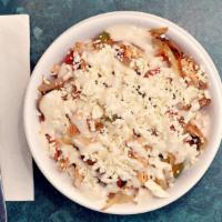 Greek Bowl · Grilled chicken, peppers, onions, Feta cheese and Greek dressing over rice.