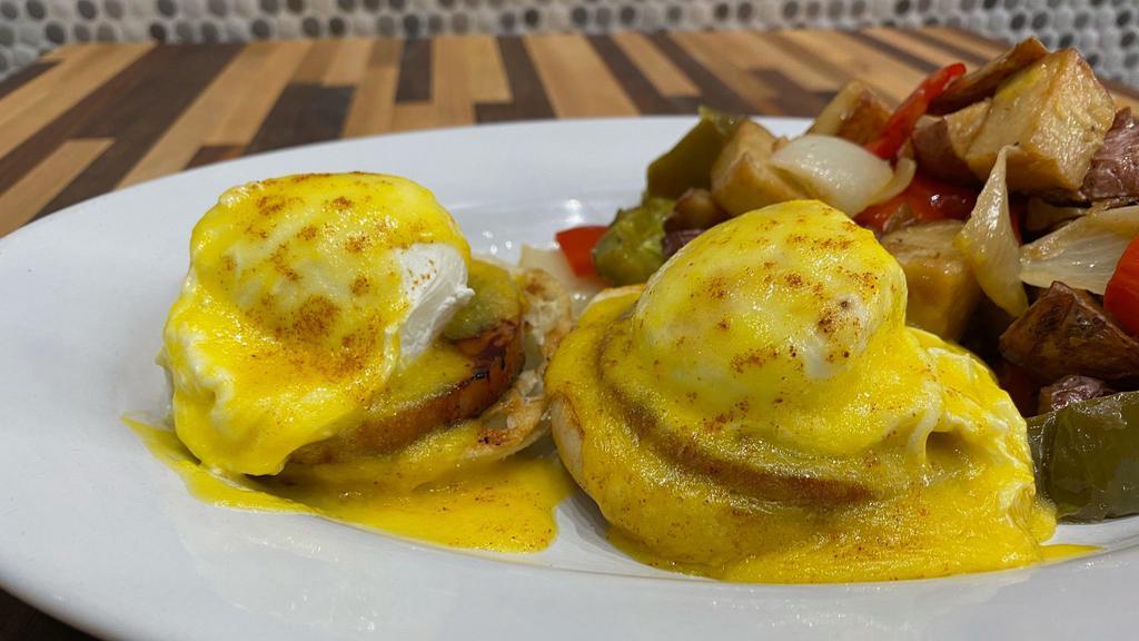 Eggs Benedict · Thick cut Canadian bacon, two eggs, on a toasted English muffin, with hollandaise sauce.