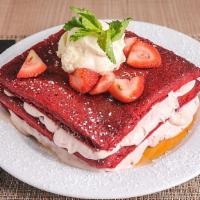 Red Velvet Pancakes · Red velvet pancakes with chocolate chips and strawberry mascarpone layers, topped with maple...