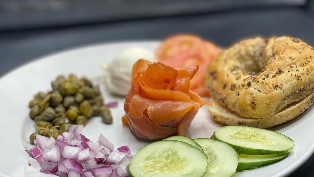 Lox & Bagel · Served traditionally with Philadelphia cream cheese, cucumbers, tomatoes, red onions, and capers with bagel.