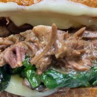Short Rib Sandwich · Roasted short ribs, served with fresh horseradish, provolone cheese, red onions, spinach, on...