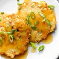 Chicken Egg Foo Young · Served with white rice.