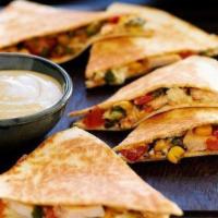 Mega Fries Quesadilla · Cooked tortilla that is filled with cheese and folded in half.