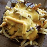 Cheese Steak Fries · Original philly steak, smothered over fries with all the toppings.