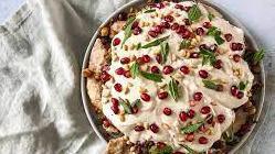 Fatteh · Eggplant and chickpea fritters spicy wax pepper yogurt, and pickled beets, tomato, onion, Gr...