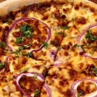 Bbq Chicken  · Fresh mozzarella, BBQ chicken, red onions and cilantro.