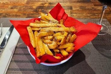Truffle Fries · Crispy bacon, grated parmigiano, herbs, drizzled with truffle oil.. (GF option)