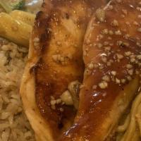Salmon · Served with hibachi soup salad vegetable fried rice and noodles.