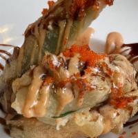 Masa Pepper Salmon · Spicy salmon, cream cheese, jalapeno, deep fried with chef's special sauce