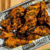 5 Wings · FLAME GRILLED WINGSWITH CHOICE OF PERI PERI  SAUCE
