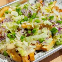 Loaded Fries · Fries served with Melted Cheese, Lettuce,
Onions and Fresh Jalapénos