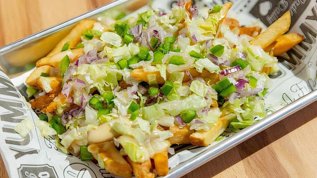 Loaded Fries · Fries served with Melted Cheese, Lettuce,
Onions and Fresh Jalapénos