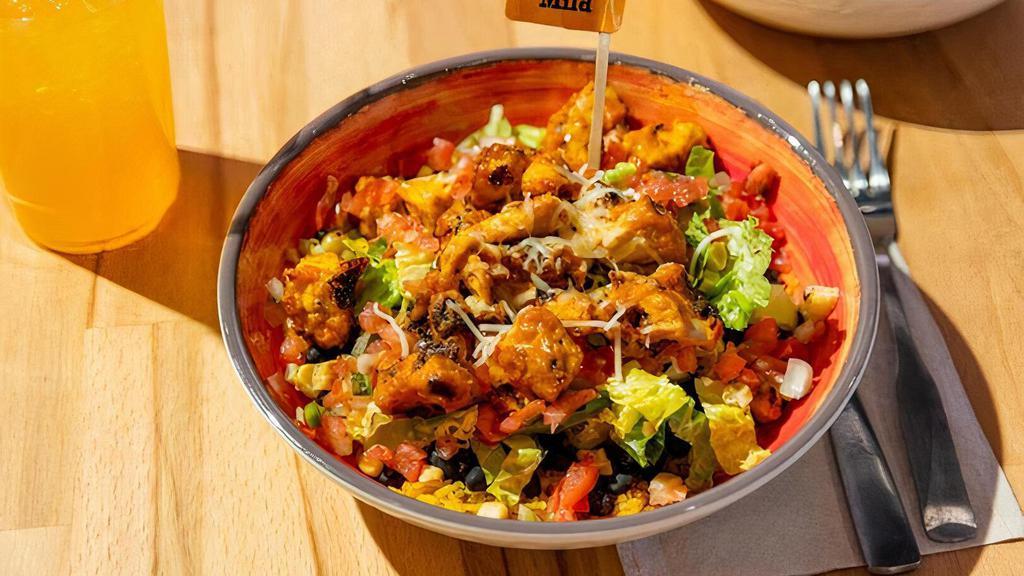 Rice Bowl · BASMATI RICE WHITE OR BROWN BLACK BEANS, CORN, PICO, LETTUCE, SHREDDED CHEESE, CHOICE OF CHICKEN OR PANEER WITH SAUCE