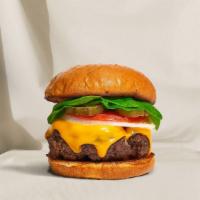 Cheese, Please! Burger · American beef patty topped with melted cheese, lettuce, tomato, onion, and pickles. Served o...
