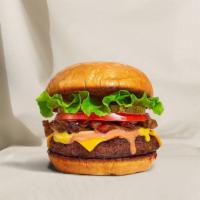 Your Kind Of Classic Burger · American beef patty topped with lettuce, tomato, onion, and pickles. Served on a big classic...