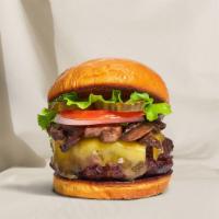 Mushroom & Cheese Love Affair Burger · American beef patty topped with mushrooms, melted cheese, lettuce, tomato, onion, and pickle...