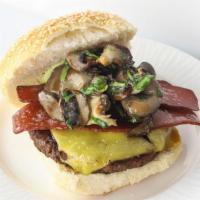 Big Kahuna Burger · 'cheddar', 'bacon' (not vegan, contains egg whites), lettuce, tomato, sautéed mushroom, cila...