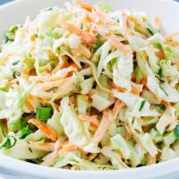 Cole Slaw · Fresh slaw cabbage mixed with our Alabama White!