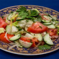 Fresh Salad · Romaine lettuce, tomatoes, cucumbers, onions with an oil and vinegar dressing.
