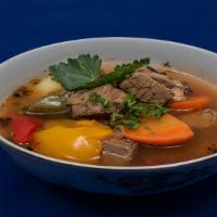 Shurpa · Light broth soup with meat and vegetables.
