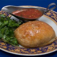Samsa · Savory meat pie with minced meat and onions.