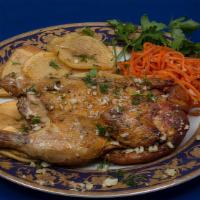 Seared Spring Chicken · Pan seared chicken marinated in a special sauce served with potatoes.