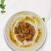 Humurous Chicken Hummus Bowl · Skewered pieces of chicken breast marinated in a mediterranean blend of herbs and spices ser...