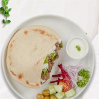 Dolce Pita Beef · Skewered pieces of top sirloin marinated in a blend of herbs and spices served in a pita poc...