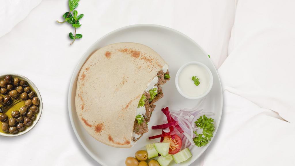 Dolce Pita Beef · Skewered pieces of top sirloin marinated in a blend of herbs and spices served in a pita pocket