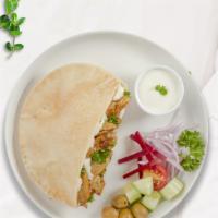 Be The Pita Chicken Shawarma · Stir fried shredded chicken breasts marinated in a mediterranean blend of herbs and spices s...