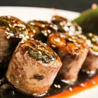Beef Negimaki (App) · Scallions wrapped with NY strip steak. Served teriyaki sauce.