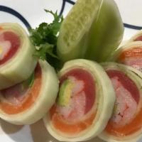 Naruto Roll · Tuna, salmon, yellowtail, avocado, crabstick, and masago wrapped in cucumber with ponzu sauce.